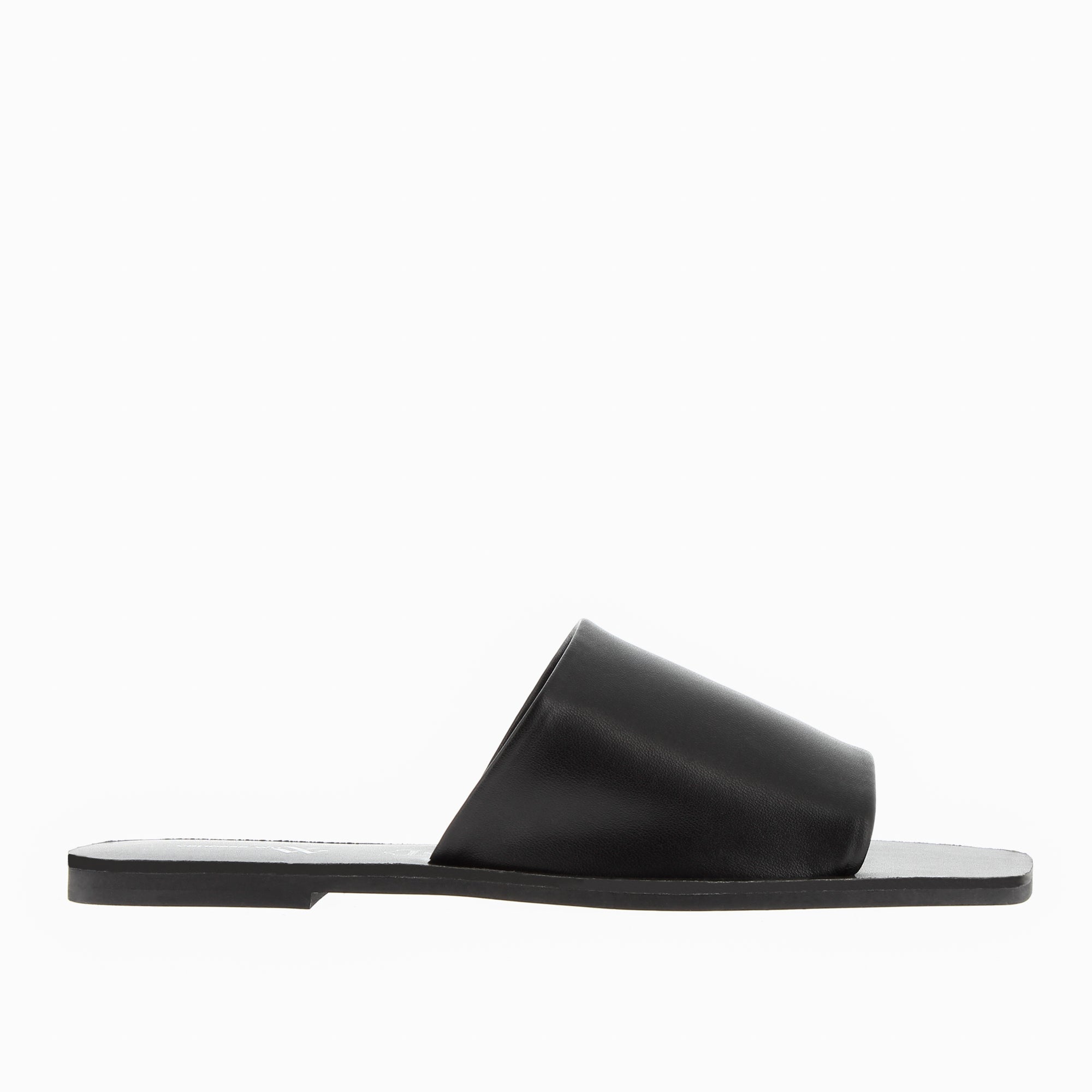 Sandra flat mules with large black strap Vanessa Wu